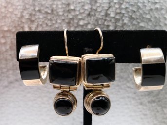 Two Pairs Of Sterling Silver And Onyx Earrings
