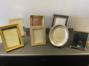 A Group Of Seven Picture Frame