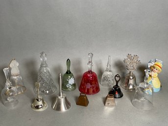 A Large Collection Of Bells Including Zodax, Val St Lambert & More