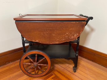 A Vintage Rolling Tea Cart