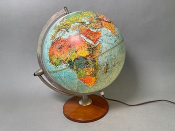 A Light Up Underwriters Laboratory World Globe On Wooden Base