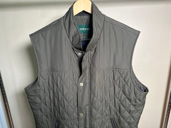 An Olive Green Orvis Vest