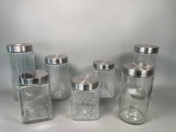 A Collection Of Glass Cannisters