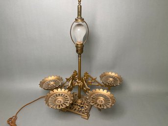 A Unique Lamp With Swivel Arms