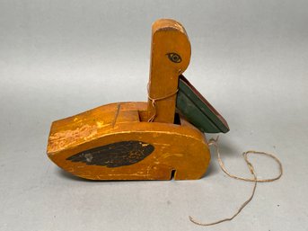 A Vintage Wooden Duck Pull Toy