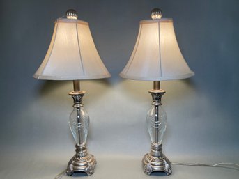A Pair Of Vintage Cut Glass & Silver Toned Lamps