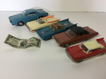 5 Plastic Cars