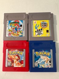 Two Pokeman, Tiny Tunes And Super Mario Gameboy Games