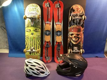 Sports Lot, Snow Skis , 2 Skate Boards, And Two Helmets Used, But In Great Shape