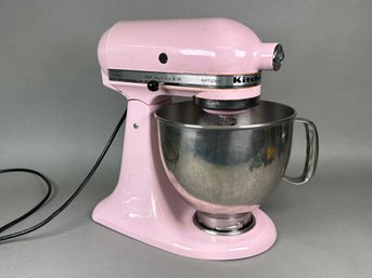 A Kitchen Aid Mixer With Bowl