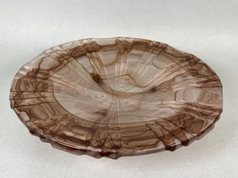 A Beautiful Glass Pedestal Platter With Swirl Design