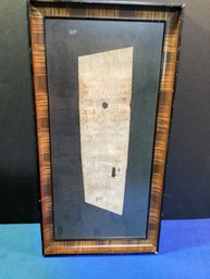 A Hand Written Note Of Marriage On Birch Bark Framed Under Glass