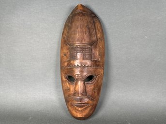 Intricately Carved Wooden Decorative Mask