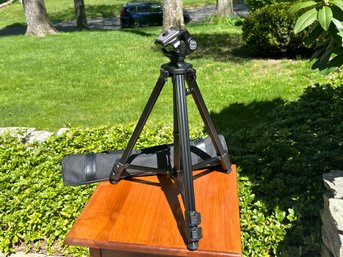 A Sears Tripod With Case