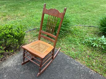 A Beautiful Antique Cane Seat Rocking Chair