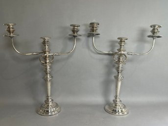 A Pair Of Large Silver Candelabras