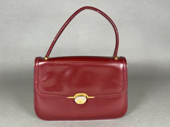 A Red Leather Gucci Handbag