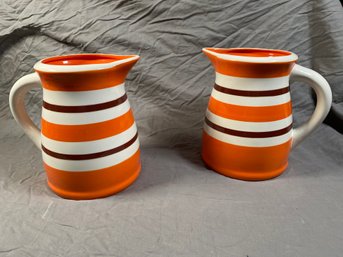 Two Bright Orange Striped Pitchers 7x8.5 Terramoto Two Earthenware No Chips Fun Decorative