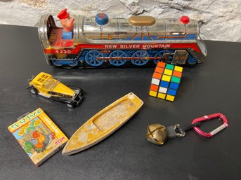 Modern Toys New Silver Mountain Train, Rubiks Cub, Toy Car, Wood Boat, Slap Jack Card Game, Brass Bell