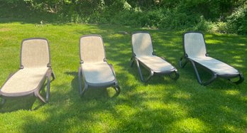 A Set Of 4 Modern Acrylic And Mesh Outdoor Lounge Chairs