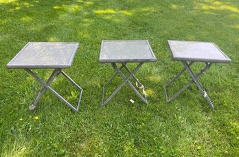 A Trio Of Outdoor Foldable Cocktail Tables