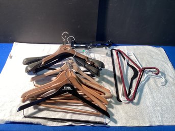 21- Clothes Hangers, Some Heavy Duty And Wood ,and Some Regular, Great Shape