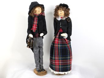 A Pair Of Christmas Carolers