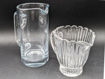 Two Small Glass Pitchers