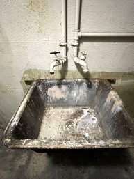 A Metal Utility Sink - Basement