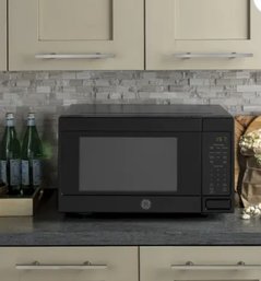 GE 1.6-cu Ft 1150-Watt Countertop Microwave (Black)