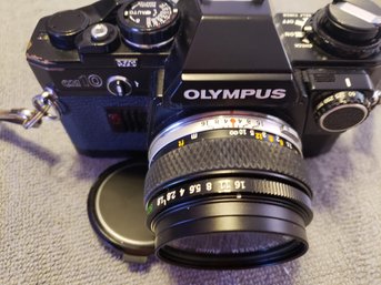 Olympus OM10 35 Mm Camera, Lenses, Flash, Case And Accessories