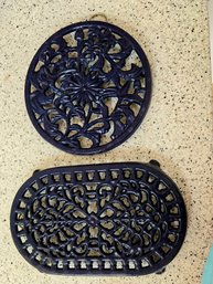 2 Decorative Cast Iron Trivets With Very Pretty Design Patterns