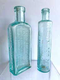 Lot Of 2 Antique Aqua Bottles- St. Jakobs Oel & Genuine Sanford's Ginger