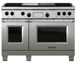 A Stainless Steel Wolf Kitchen Range With Griddle And Ovens