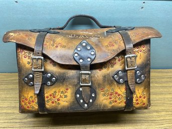 Beautifully Tooled Heavy Leather Saddle Bag With Snaps, Buckles, Rivets And Top Handle.