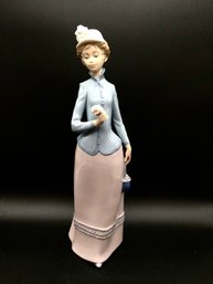 Lladro Miss Theresa With Rose Porcelain Figurine