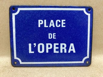 Vintage Place De L'Opera Porcelain Advertising Enamel Metal Hanging Sign. Measures 3 13/16' X 5'.