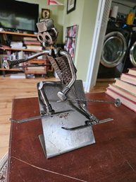 #38 - Vintage Metal Alpine Skier Sculpture Is 10