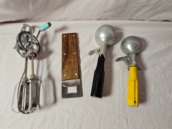 Selection Of Vintage Kitchen Utensils, Ice Cream Scoop, Bottle Opener And Whisk
