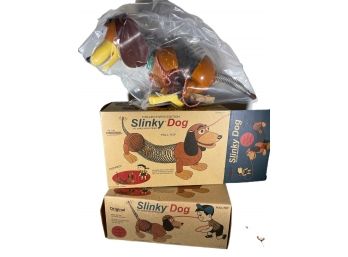 Two Slinky Dog Toys In Their Original Boxes