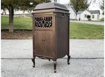 An Antique Silvertone Phonograph And 78 Records