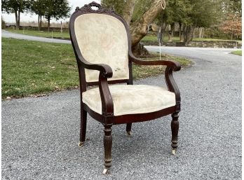 An Antique Carved Wood Parlor Chair