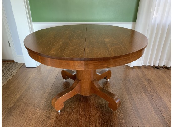 Antique Oak Pedestal Table With Two Leaves