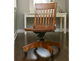 Vintage Wood Bankers Chair On Casters