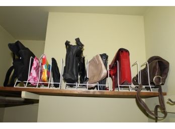 Collection Of Women’s Handbags With Metal Purse Stands