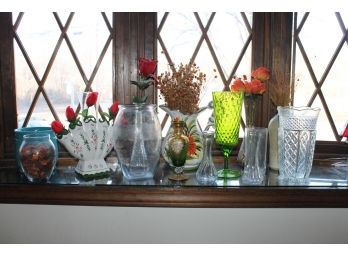 Arrangement Of Ceramic Vases And Glass Pitchers