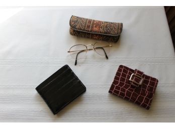 Pair Of Wallets And Eyeglasses With Case