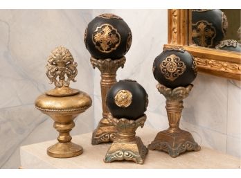 Group Of Three Decorative Spheres On Stands And A Lidded Urn