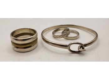 Sterling Silver Bangle Clasp Bracelet Paired With Three Sterling Rings