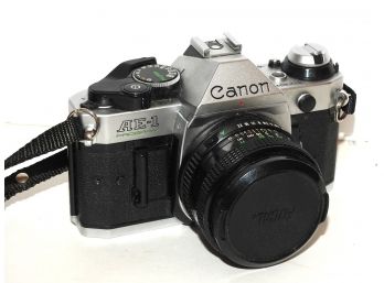 Vintage Canon AE-1 35mm Camera With Lens And Strap